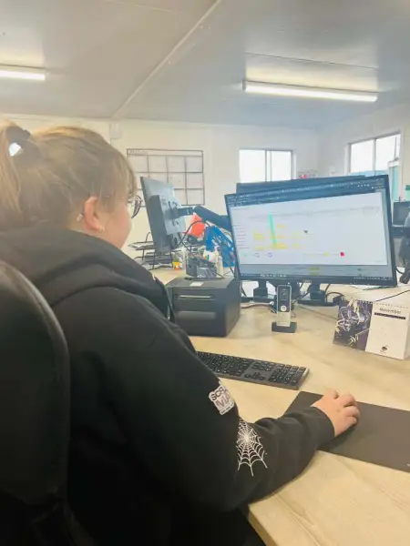 Xanthe is booking in a scrap car for collection. Xanthe is booking in a scrap car for collection.: Swipe To View More Images