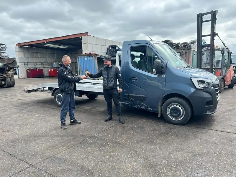 Jamie is handing over the keys to Lukasz's new recovery truck. Jamie is handing over the keys to Lukasz's new recovery truck.: Swipe To View More Images
